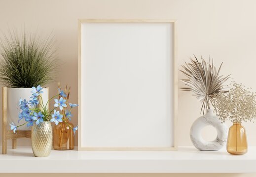 Poster mockup with vertical wooden frame in home interior background.