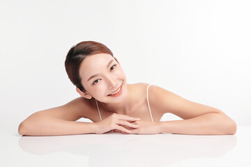 Fototapeta premium Beautiful young asian woman with clean fresh skin on white background, Face care, Facial treatment, Cosmetology, beauty and spa, Asian women portrait.