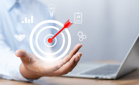 Concept Of Business Strategy And Future Sustainable Business Finance Action Plan. Hand Holding Target Board For Creative And Set Up Business Objective Target And Success And Business Goals Concept.