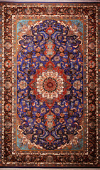 Persian carpet in red purple color with antique pattern on the floor top view