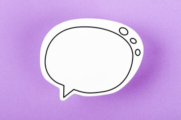 The Speech bubble with copy space communication talking speaking concepts on purple background.
