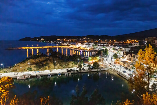 Panoramic night view of Limenaria harbor city of Thasos island Greece, North Aegean Sea