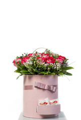 Bouquet of red roses in a gift box isolated on white background