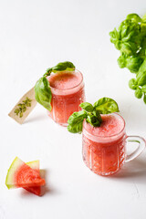 watermelon shake with basil on a white background