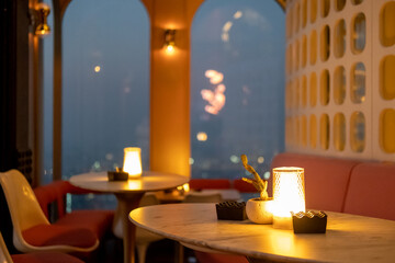 Seating on the terrace of the restaurant with a sky view during sunset