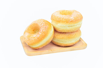 sugar coated  donut in square wood tray on white background closeup,isolated