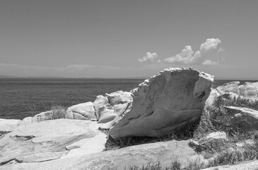 scenic view of the idyllic sea of ​​rocks in greece in black and white
