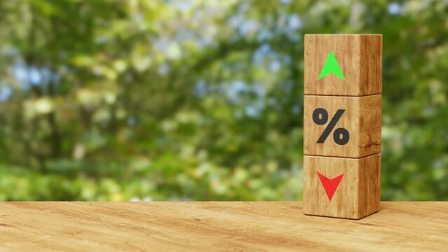 Wooden cubes changes the direction of an arrow symbolizing that the interest rates are going down or vice versa. Business concept. Copy space. 4K 3D animation