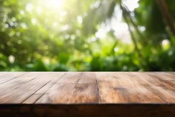 Deurstickers Leerer Holztisch für Produktplatzierung oder Montage mit Fokus auf die Tischplatte, unscharfer Bokeh-Hintergrund in der Natur mit grünen Bäumen generative ai © FJM