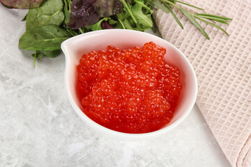 Red caviar in the bowl