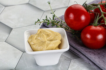 Dijon mustard sauce in the bowl