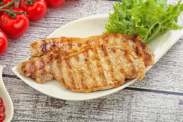 Grilled pork steak with ketchup