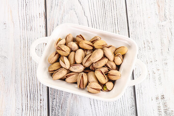 Salted tasty pistachio nuts heap