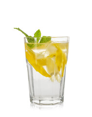 Glass of tasty lemonade with mint on white background
