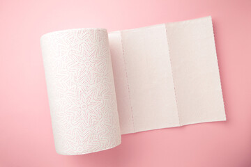 Roll paper towels on on pink background