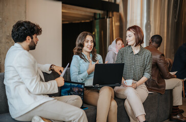 Young woman sitting at a table with her friends in a cafe