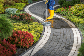 Power Washing Residential Garden Pathway Using Concrete Surface Attachment