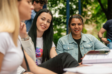 Fototapeta premium Classmates smiling and talking