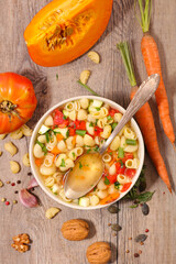 Minestrone soup in bowl- soup with vegetables and pasta