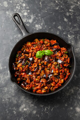 Sicilian Eggplant, Aubergine caponata in iron cast pan