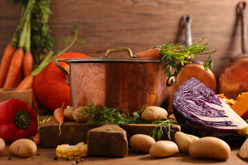 cooking pot with ingredients for vegetable soup