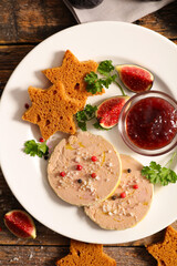 Traditional foie gras with fresh figs and gingerbread canape- french festive food