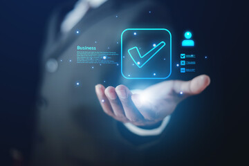 businessman uses technology to take online checklist survey Mark checklists and complete online forms. Question answer concept. Assessment. Online survey.	