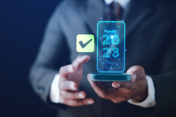 businessman uses technology to take online checklist survey Mark checklists and complete online forms. Question answer concept. Assessment. 2023 Online survey.	
