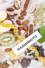 Fototapeta na wymiar Nutritious healthy ingredients and inscription hashimoto. Problems with thyroid concept