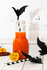 Cute Halloween pumkin juice, drinks for a kids party. Decor drinks for Halloween