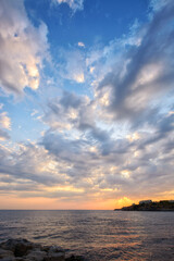sunrise at the sea. gorgeous seaside scenery with clouds on the sky. vacation in sozopol