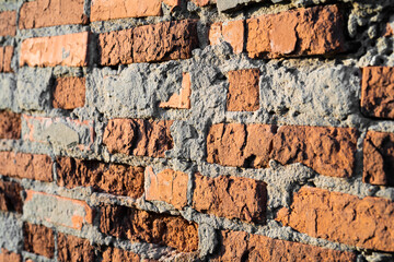 texture of old cracked and destroyed red brick wall