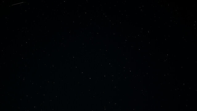 Starry sky. Night sky. Starfall on the night of August 12 to August 13. Falling star. Texture, background.