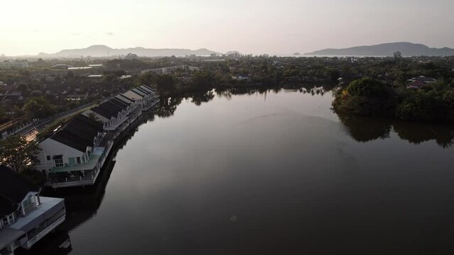 Phuket Town Lake near Wat Chalong  at Phuket, Thailand. Drone flight DJI 4K morning dawn