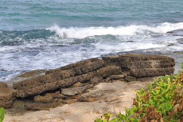 waves crashing on rocks
