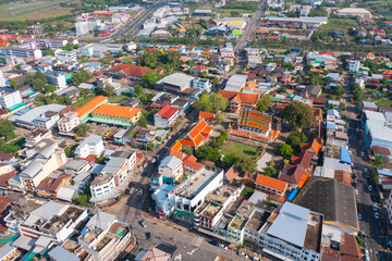 Aerial view of residential neighborhood roofs. Urban housing development from above. Top view. Real...
