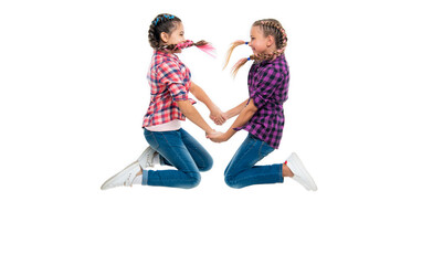 bond of sisterhood and friendship. girls friends having fun and jumping. friendship of two children. happy girls sisterhood. children have fun together. endless fun