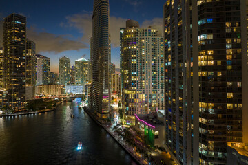 Night urban landscape of downtown district of Miami Brickell in Florida, USA. Skyline with brightly illuminated high skyscraper buildings in modern american megapolis