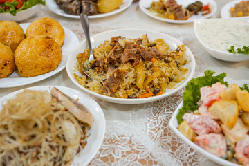 Assorted Uzbek food set, pilaf, samsa, lagman, manta, shurpa central asia food. Homemade Uzbek...