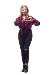 Fototapeta premium casual young woman in a red checked shirt and tight pants.