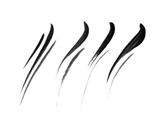 Black liquid eyeliner strokes isolated on white background. Cosmetic eye pencil product texture swatch - obrazy, fototapety, plakaty