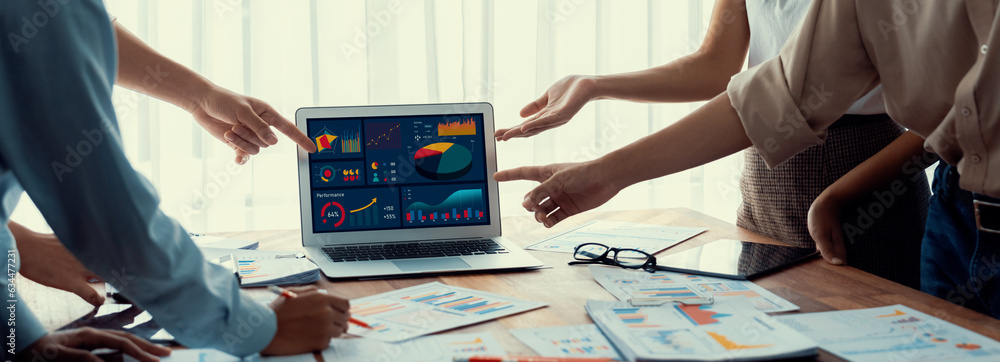 Leinwandbilder panorama shot analyst team utilizing bi fintech to analyze financial report with laptop. businesspeo