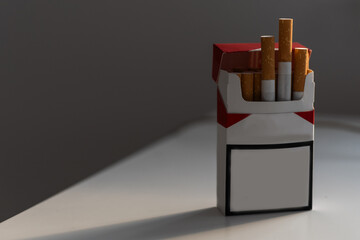 Smoking concept. Blank no name cigarettes packets isolated on black background, space for text. 3d illustration