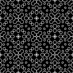 White background with black pattern. Seamless texture for fashion, textile design,  on wall paper, wrapping paper, fabrics and home decor. Simple repeat pattern.