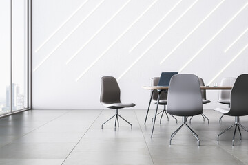 Modern white conference room interior with window and city view, furniture, equipment and decorative lines on wall. 3D Rendering.