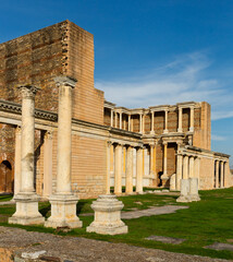 View of notable ruins of Roman bath-gymnasium complex in ancient Sardis city in sunny winter day, Turkey