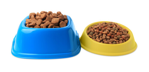 Dry pet food in feeding bowls on white background