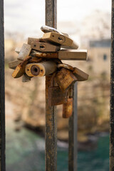 A bunch of locks in a banister in Monopoli, Puglia, Italy. Traditional way of showing the love to a couple. Very secured not easy for thiefs and hackers