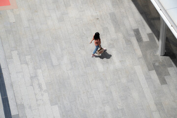 Top view crowd of people walks on a business street pedestrian in the city
