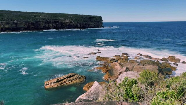 4k Video -Beautiful view from above at Wattamolla, from the coastal walking trail to Providential Point lookout in Royal National Park, located South of Sydney, NSW, Australia.